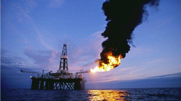 Oil exploration platform burns off natural gas.
