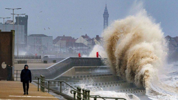 Waves crashing on the seafront at Blackpool before Storm Dudley hits the north of England on  Wednesday.

