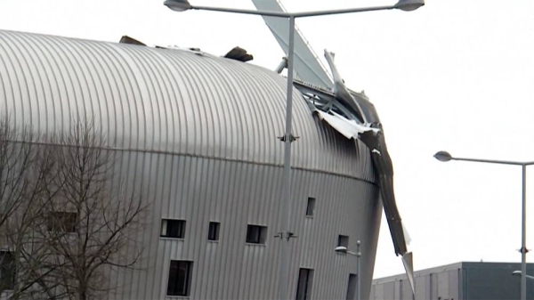 The gale force winds blew off part of the roof of the ADO Den Haag football stadium and sent roof debris flying as Storm Eunice continued to sweep northwestern Europe on Saturday morning.