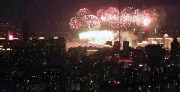 Fireworks explode during the closing ceremony of the 2022 Winter Olympics, Sunday, in Beijing.