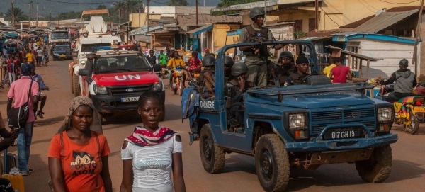 MINUSCA peacekeepers and Central African defense and security forces patrol Bangui.
