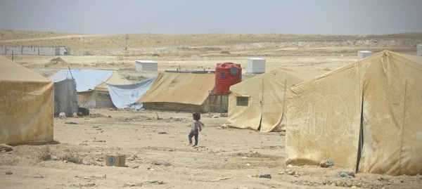 A child walks in Al Hol camp in northeast Syria where more than 90 per cent of the people are women and children.