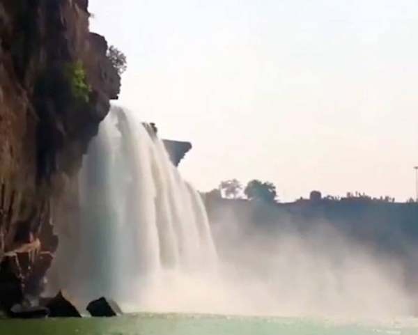 A scenic waterfall in Chattisgarh, India, offers a tourist a varity of adventure amid a calm setting.