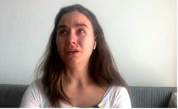 Liza Grach emotionally describes fleeing Ukraine with her 10-month-old baby, but leaving her husband behind.