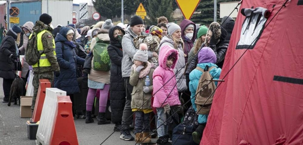 Thousands of Ukrainians seek safety in neighboring Poland. — courtesy WFP/Marco Frattini