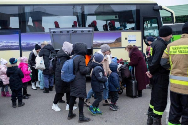 Refugees from Ukraine arrive in Poland at the Medyka border crossing. — courtesy UNHCR/Valerio Muscella