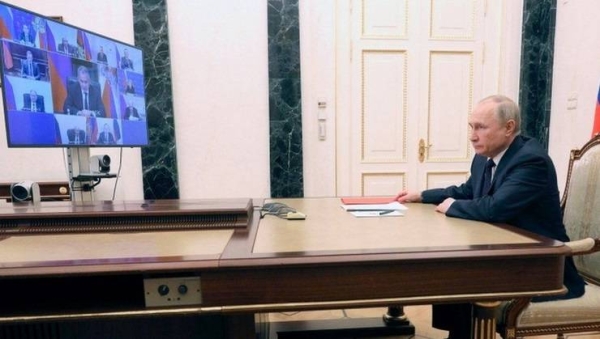 President Vladimir Putin chairs a Russian security council meeting via video link.