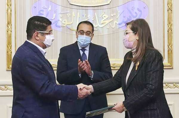 Minister of State and Member of the Council of Ministers for Shoura Council Affairs Dr. Essam Bin Saad Bin Saeed and Egyptian Minister of Planning and Economic Development Dr. Hala Al-Saeed sign the agreement in presence of Egyptian Prime Minister Dr. Mostafa Madbouly.