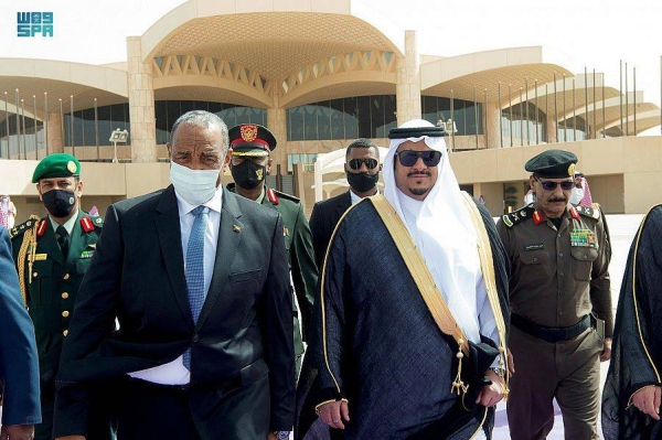 Lt. Gen. Abdul Fattah Al-Burhan is being seen off at King Khalid International Airport in Riyadh.