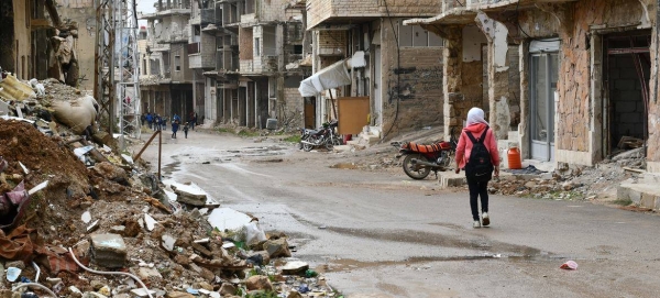 Children walk through a neighborhood in Zabadani, rural Damascus, in Syria.