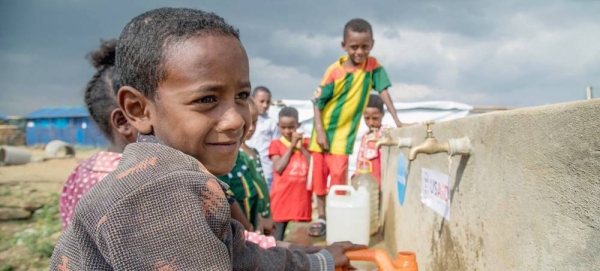 Displaced children collect water in Mekelle, capital of Tigray Region, Ethiopia. — courtesy UNICEF/ Esiey Leul