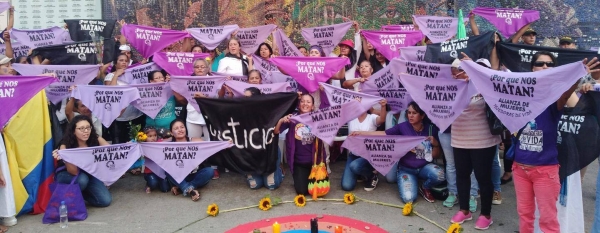 Activists and members of Colombian NGO 'Tejedoras de Vida' hold a demonstration for the end of violence against women.
