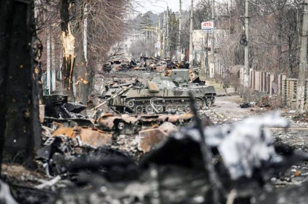 A devastated Ukraine area shows the heavy-haned Russian military invasion harming civilians in occupied areas.