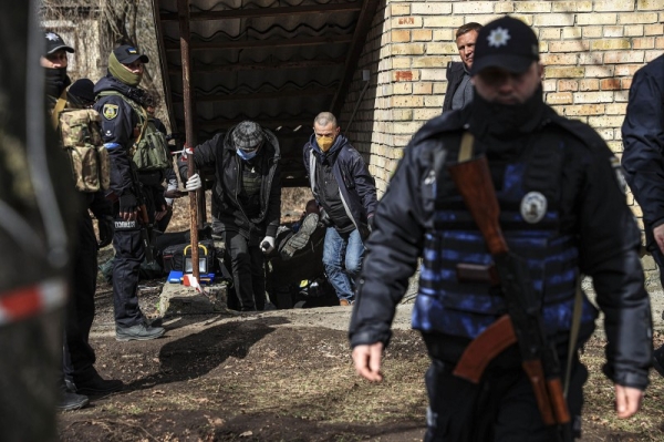 Civilians' bodies, which were found dead in the Ukrainian town of Bucha, were gathered to be buried on Monday, on April 4, 2022 in Bucha, Ukraine. 