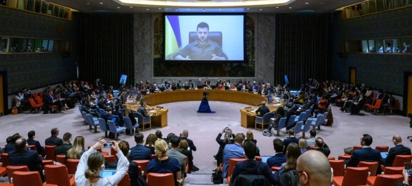 A wide view of the Security Council Chamber as President Volodymyr Zelensky (on screen) addresses the Council meeting on the situation in Ukraine.