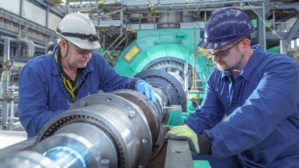 People working in a power plant.
