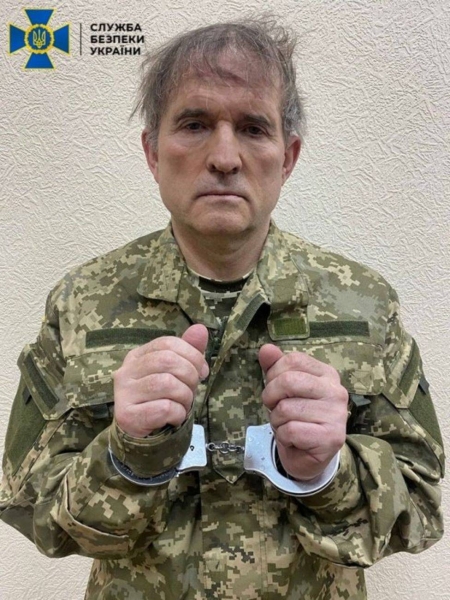 Ukraine's security service posted a photo purportedly showing Viktor Medvedchuk in handcuffs and wearing military fatigues.