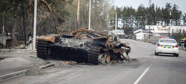 A destroyed tank is abandoned on the road to Bucha, Ukraine. — courtesy WFP/Marco Frattini