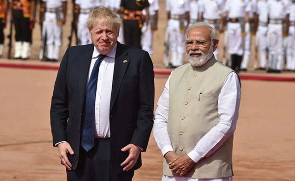 Prime Minister Boris Johnson is received by his Indian counterpart Narendra Modi in New Delhi.