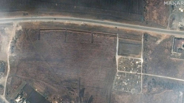 A satellite image by Maxar purportedly showing four sections of linear rows of graves near Mariupol.