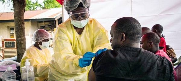 Health workers put on personal protective equipment (PPE) before entering an Ebola quarantine zone in the Democratic Republic of the Congo. — courtesy (file) World Bank/Vincent Tremeau