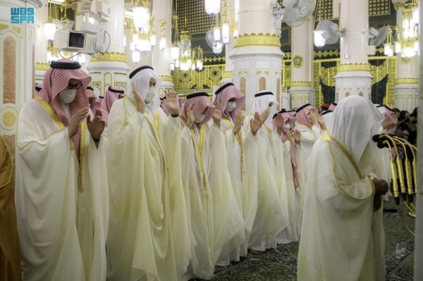 Muslims perform Eid Al-Fitr prayer in Madinah on Monday morning.