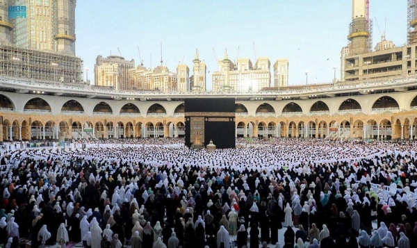 Muslims perform Eid Al-Fitr prayer in Makkah on Monday morning.