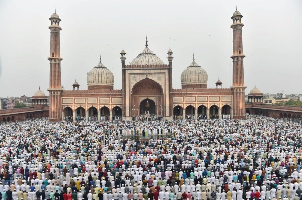 Muslims offer prayers at the Jama Masjid on the occasion of Eid Al-Fitr, in old Delhi, on Tuesday. 