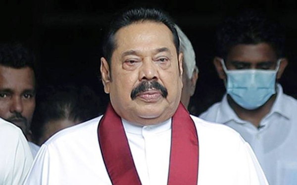 Former Prime Minister Mahinda Rajapaksa, the president's elder brother and a two-time former president, is holed up in a naval base in the north-east for his own safety.