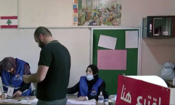 Voters cast their votes at the Lebanese polling stations to elect their 128-seat Parliament.