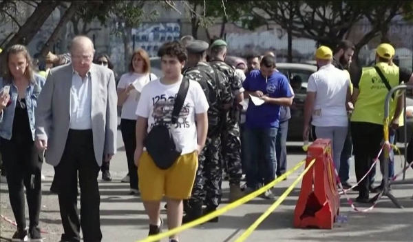 Voters cast their votes at the Lebanese polling stations to elect their 128-seat Parliament.