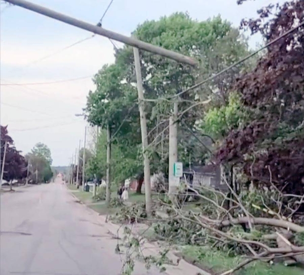 The deadly storm moving through Ontario, Canada, felled trees and caused power outages.