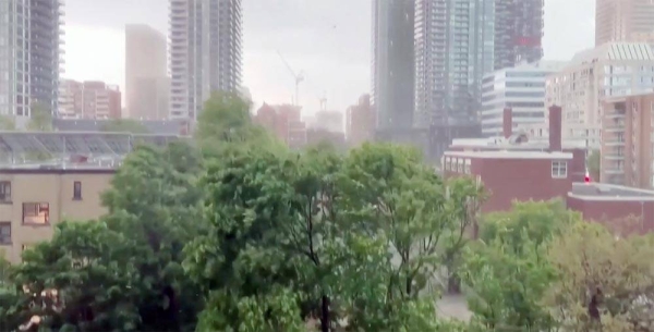 The deadly storm moving through Ontario, Canada, felled trees and caused power outages.