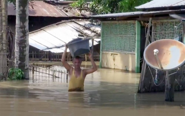 Severe flooding in the eastern Indian state of Assam has displaced tens of thousands and killed at least 24 people.
