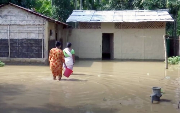 Severe flooding in the eastern Indian state of Assam has displaced tens of thousands and killed at least 24 people.