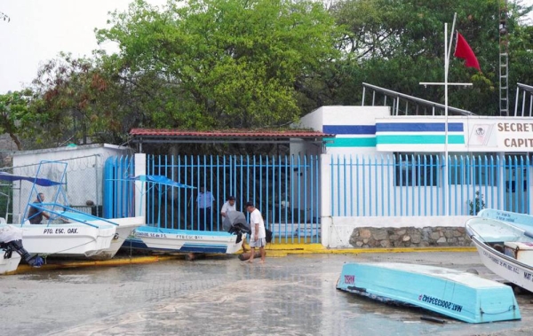 Hurricane Agatha plowed into beach resorts on Mexico's southern Pacific coast on Monday, bringing torrential rains and the threat of flooding as the first named storm in the eastern Pacific this year.