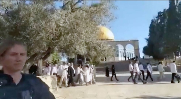 Hundreds of Israeli settlers on Sunday raided the courtyards of Al-Aqsa Mosque from 