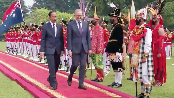 Australian Prime Minister Anthony Albanese is welcomed in Jakarta by Indonesian President Joko Widodo.