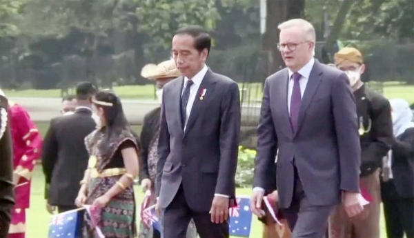 Australian Prime Minister Anthony Albanese is welcomed in Jakarta by Indonesian President Joko Widodo.