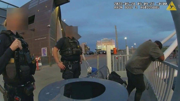 Police body cam footage shows the officers interacting with Sean Bickings before he gets into Tempe Town Lake.