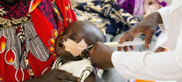 A 6-month-old, malnourished boy in South Sudan receives milk through a feeding tube. . — courtesy  UNICEF/Bullen Chol