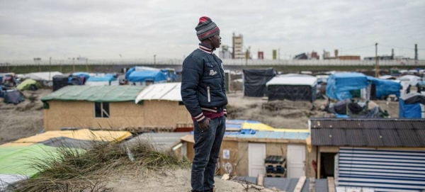 A young migrant from Darfur waits to reach England from Calais, France. — courtesy UNICEF/Laurence Geai