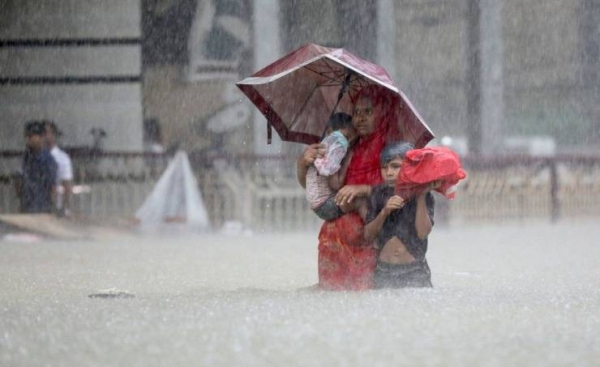 Dozens killed, millions stranded as floods ravage parts of Bangladesh, India