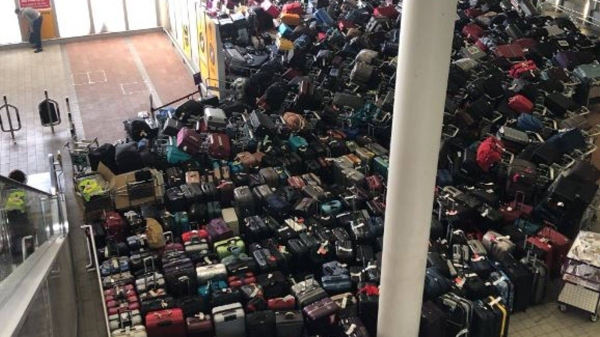 Heathrow Airport authorities announced on Monday that it has requested all airlines to decrease flights by 10 percent as passengers' luggage pile up due to technical error.