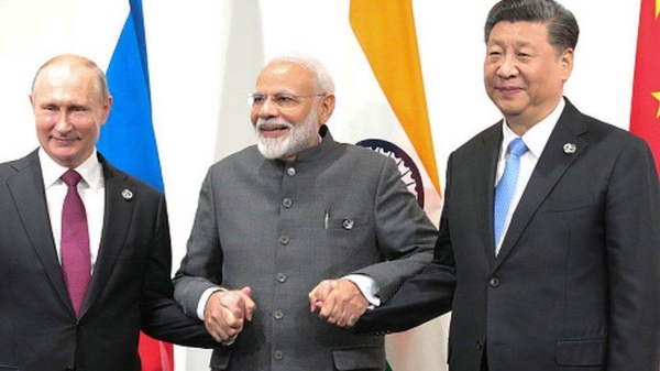 Three of the Brics leaders — (L-R) Vladimir Putin, Narendra Modi and Xi Jinping — were all smiles in this 2019 file photo.