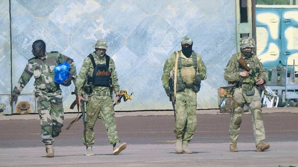 An undated file photograph issued by French military shows three Russian mercenaries, right, in northern Mali. — courtesy French Army