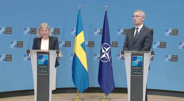 
NATO Secretary General Jens Stoltenberg and Prime Minister of Sweden Magdalena Andersson give a press conference prior to a NATO summit in Brussels, on Monday.