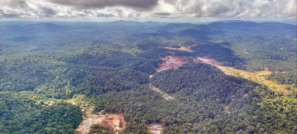 UN Secretary-General António Guterres surveys the Central Suriname Nature Reserve, which comprises 1.6 million ha of primary tropical forest of west-central Suriname. — courtesy UN News/Evan Schneider
