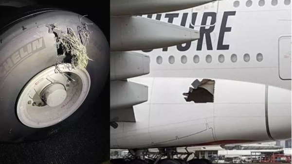 Passengers noticed the large hole gouged into the side of the plane when they disembarked in Australia.