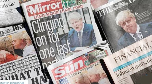 Front pages of British national newspapers, each leading with a front page story of the resignation of Boris Johnson as leader of Britain's Conservative Party, on Friday.
